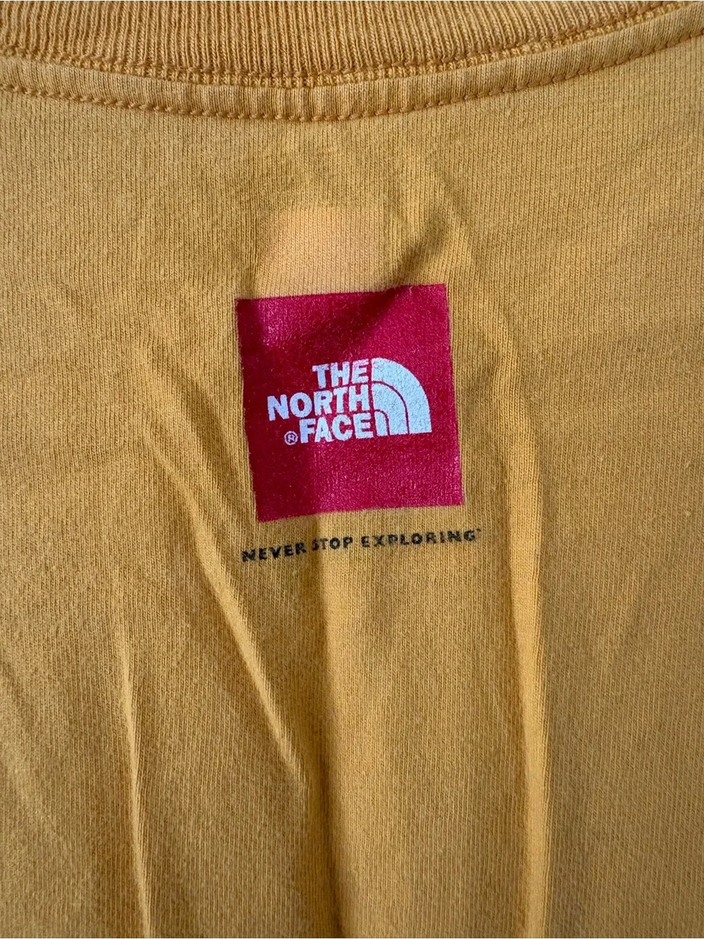 The North Face Men's Yellow 'Never Stop Exploring' Logo Tee